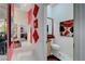 Powder room featuring designer sink, fixtures, artwork and decor adjacent to hallway at 5305 Bright Sun Ct, Las Vegas, NV 89130