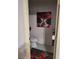 Half-bathroom featuring a toilet, stylish rug, and elegant art in a small space at 5305 Bright Sun Ct, Las Vegas, NV 89130