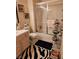 Nicely decorated bathroom with shower, cabinet, and decorative towels at 5305 Bright Sun Ct, Las Vegas, NV 89130
