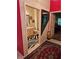 A bathroom featuring a zebra rug and beige cabinet with framed pictures on the wall at 5305 Bright Sun Ct, Las Vegas, NV 89130