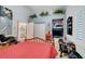 Bright bedroom featuring shutters, closet, overhead plant shelf, and stylish decor at 5305 Bright Sun Ct, Las Vegas, NV 89130