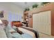 Bedroom featuring shutters, closet, and stylish décor at 5305 Bright Sun Ct, Las Vegas, NV 89130