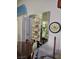 Dining room area featuring a decorative mirror, a clock, and a round wood table at 5305 Bright Sun Ct, Las Vegas, NV 89130