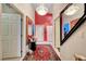 Hallway featuring tiled floor, chandelier, ornate mirrors, and access to rooms at 5305 Bright Sun Ct, Las Vegas, NV 89130