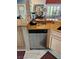Close up of kitchen including dishwasher and decorative granite countertop at 5305 Bright Sun Ct, Las Vegas, NV 89130