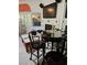 Open concept living area with fireplace, tv, and european style mural on wall at 5305 Bright Sun Ct, Las Vegas, NV 89130