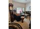 Cozy living room featuring plush sofas, patterned cushions, and an antique grandfather clock at 5305 Bright Sun Ct, Las Vegas, NV 89130