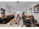 Spacious living room with neutral tones, shuttered windows, and an open layout at 5305 Bright Sun Ct, Las Vegas, NV 89130