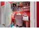 Bright office features custom built-in shelving with a vintage desk and chair at 5305 Bright Sun Ct, Las Vegas, NV 89130