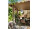 Relaxing outdoor patio featuring cozy seating and a shaded pergola at 5305 Bright Sun Ct, Las Vegas, NV 89130