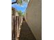 Side yard with gravel and a view of the building exterior at 5305 Bright Sun Ct, Las Vegas, NV 89130