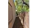 Narrow side yard space with gravel at 5305 Bright Sun Ct, Las Vegas, NV 89130