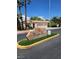 Community entrance sign 'Bright Sun' with a palm tree at 5305 Bright Sun Ct, Las Vegas, NV 89130