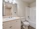 Bright bathroom features a white vanity and a shower-tub combination at 5330 E Charleston Blvd # 28, Las Vegas, NV 89142