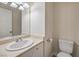 Well-lit half-bath with single sink vanity and updated fixtures at 5330 E Charleston Blvd # 28, Las Vegas, NV 89142