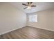 Cozy bedroom featuring a ceiling fan, window, and durable floors at 5330 E Charleston Blvd # 28, Las Vegas, NV 89142