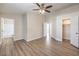 Spacious bedroom featuring an ensuite bathroom, walk-in closet, and neutral color palette at 5330 E Charleston Blvd # 28, Las Vegas, NV 89142