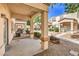 Covered patio area with desert landscaping and neighborhood view at 5330 E Charleston Blvd # 28, Las Vegas, NV 89142