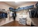 Spacious walk-in closet with custom shelving for optimal organization and storage space at 5850 Rockway Glen Ave, Las Vegas, NV 89141