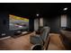 Enjoy movies in this theater room featuring a large screen and comfortable seating at 5850 Rockway Glen Ave, Las Vegas, NV 89141