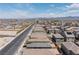 Aerial view showcasing the neighborhood's layout and surrounding landscape at 5937 W Frias Ave, Las Vegas, NV 89141