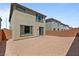 The backyard features an outdoor living space perfect for entertaining guests at 5937 W Frias Ave, Las Vegas, NV 89141