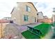Private backyard with artificial turf and paved patio, perfect for outdoor living and entertaining at 6046 Castle Gardens Ave, Las Vegas, NV 89130