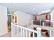 Bright and airy landing area with railing at 6046 Castle Gardens Ave, Las Vegas, NV 89130
