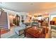 Open floor plan showcasing the living room with staircase and decor at 6046 Castle Gardens Ave, Las Vegas, NV 89130