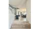 Entryway with tiled floor and staircase that leads to the dining room at 6269 Bold Regatta Ct, Las Vegas, NV 89139