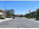 Neighborhood street view showcasing well-maintained homes and landscaping in a residential area at 6269 Bold Regatta Ct, Las Vegas, NV 89139