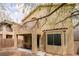 Exterior rear of the home featuring a balcony, covered patio, and view of the backyard at 6279 Dollar Bill Ct, Las Vegas, NV 89141