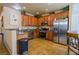 Well-equipped kitchen featuring stainless steel appliances and wood cabinetry at 6279 Dollar Bill Ct, Las Vegas, NV 89141