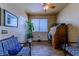 Office area with wood floors, good lighting and comfortable furnishings at 6279 Dollar Bill Ct, Las Vegas, NV 89141