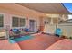 Backyard area features a patio, sun shade, outdoor furniture and additional space at 6433 Buck Jones Ave # 102, Las Vegas, NV 89122
