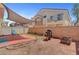 A shaded backyard featuring a brick patio, a grill, and space for outdoor recreation at 6433 Buck Jones Ave # 102, Las Vegas, NV 89122