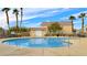 Sparkling community pool with clear blue water, secure fencing, and a pool-side shower station at 6433 Buck Jones Ave # 102, Las Vegas, NV 89122