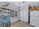Cozy dining area featuring tile floors, a wine rack, and a window providing natural light at 6433 Buck Jones Ave # 102, Las Vegas, NV 89122