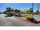 Street view of Hollywood Ranch community sign on a sunny day, surrounded by landscaped greenery at 6433 Buck Jones Ave # 102, Las Vegas, NV 89122