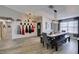 Cozy dining space with a built-in sideboard, seamlessly flowing into the kitchen and living areas at 6517 W Brooks Ave, Las Vegas, NV 89108