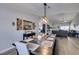 Open floor plan featuring dining area connected to the kitchen and living room at 6517 W Brooks Ave, Las Vegas, NV 89108