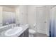 Well-lit bathroom with a granite countertop and modern fixtures at 7003 Crimson Shadow St, North Las Vegas, NV 89086