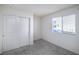 Bright bedroom with a window and closet at 7003 Crimson Shadow St, North Las Vegas, NV 89086