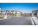 Gated community entrance with modern metal gates and well-maintained landscaping, ensuring privacy at 7003 Crimson Shadow St, North Las Vegas, NV 89086