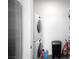 Bright laundry room with stacked washer and dryer at 7003 Crimson Shadow St, North Las Vegas, NV 89086