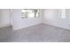 Spacious living room with large window at 7003 Crimson Shadow St, North Las Vegas, NV 89086