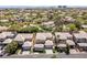 Aerial view of the home in a lush neighborhood, featuring mature trees and well-maintained landscaping at 712 Proud Eagle Ln, Las Vegas, NV 89144