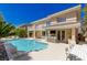 Overhead view of the backyard with a pool, patio, and a complete outdoor kitchen at 712 Proud Eagle Ln, Las Vegas, NV 89144