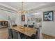 Dining area with modern table, chairs, and view into the living area at 712 Proud Eagle Ln, Las Vegas, NV 89144