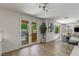 Open dining area with views of the backyard pool, adjacent to the modern kitchen and living spaces at 712 Proud Eagle Ln, Las Vegas, NV 89144
